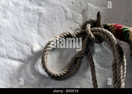 Tied bell rope in the bell tower of St. Mary`s Church, Pillerton Hersey, Warwickshire, England, UK Stock Photo